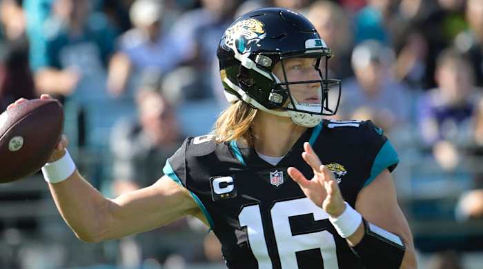 Jacksonville Jaguars quarterback Trevor Lawrence sets back to pass